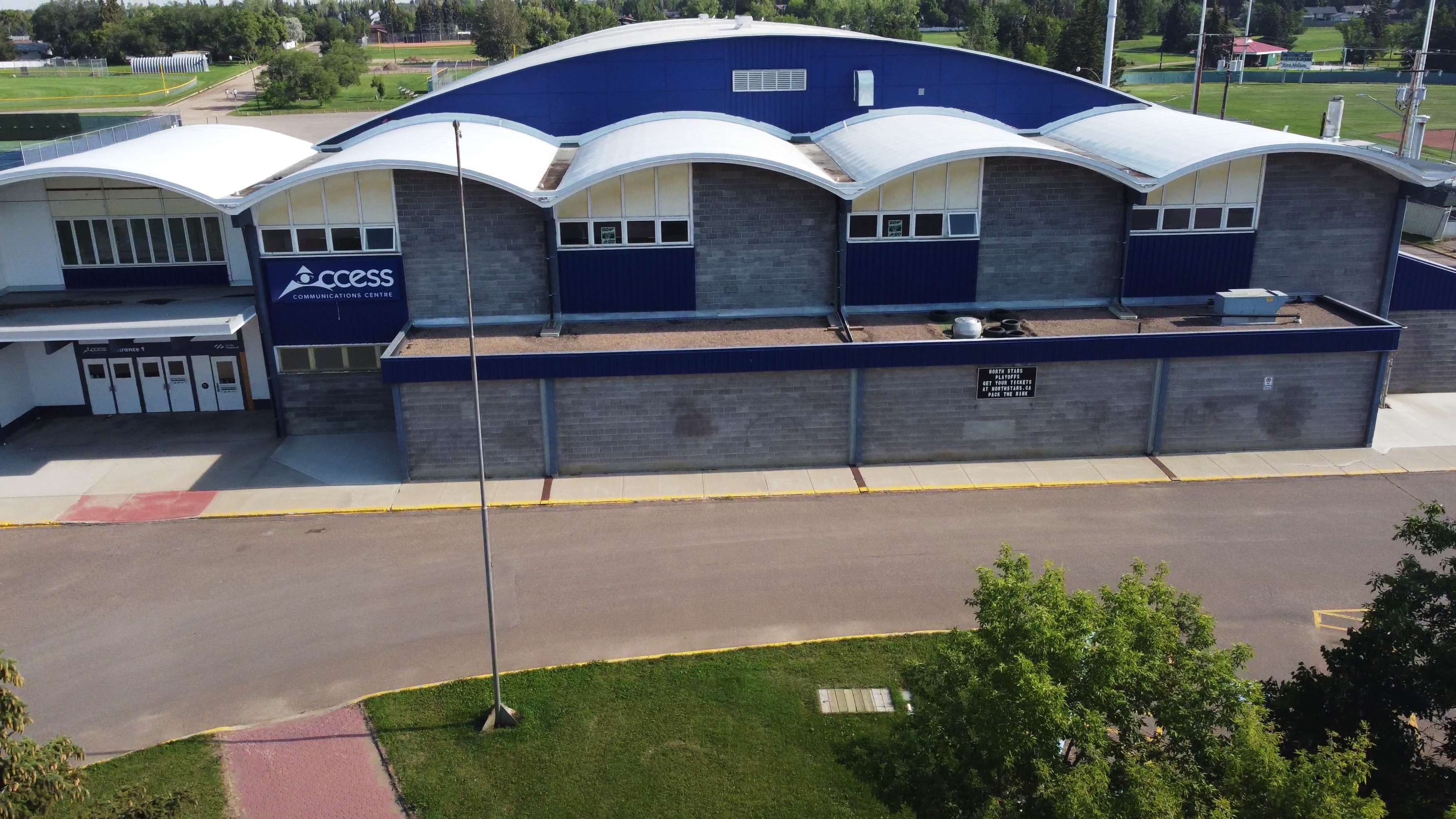 A summer aerial view of the front of the Access Communications Centre.
